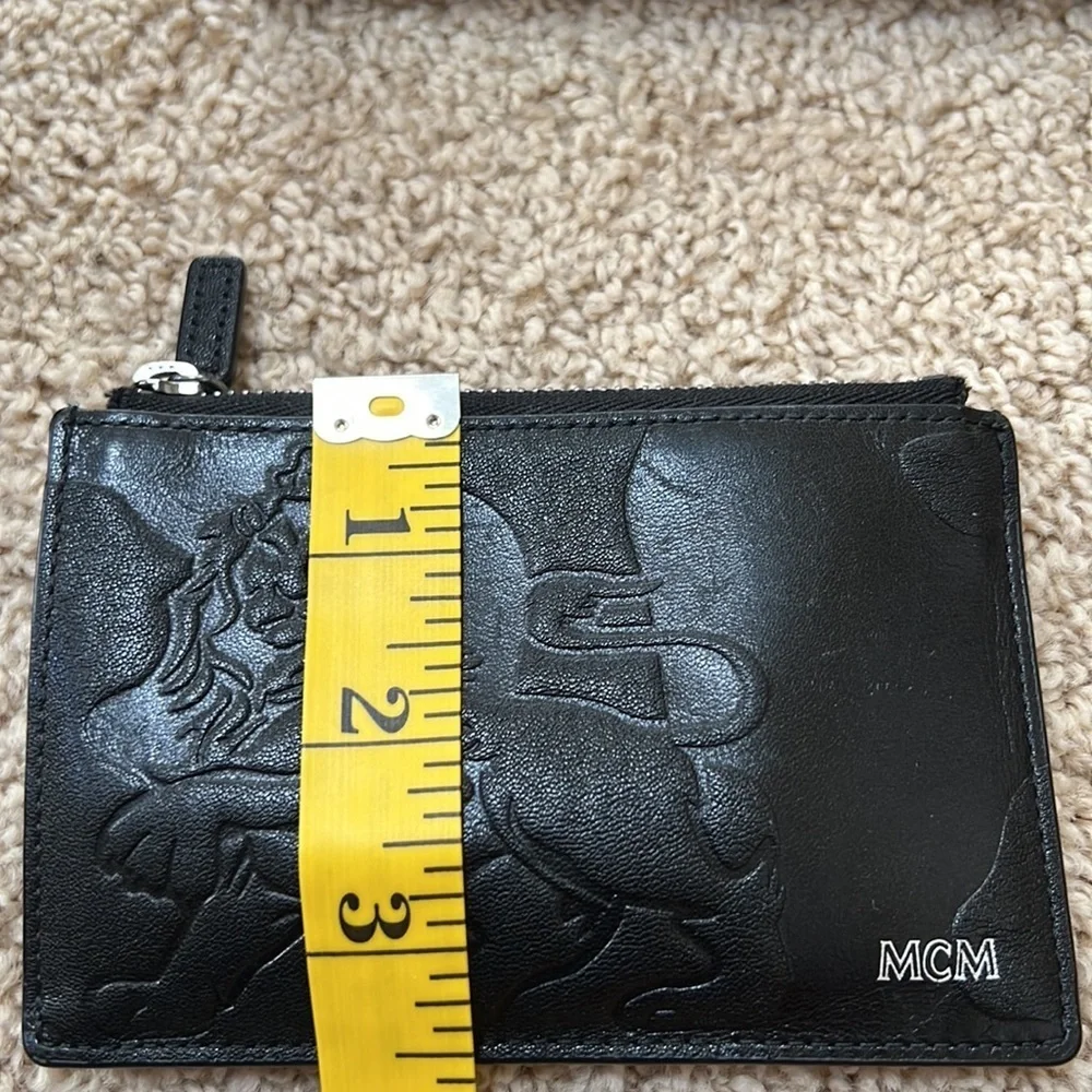 MCM men's lion embossed black with blue and grey mini zipped coin card holder